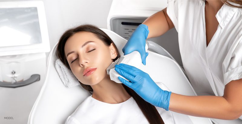 woman receiving laser treatment