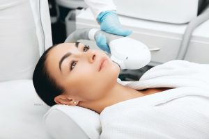 Woman getting a facial treatment.
